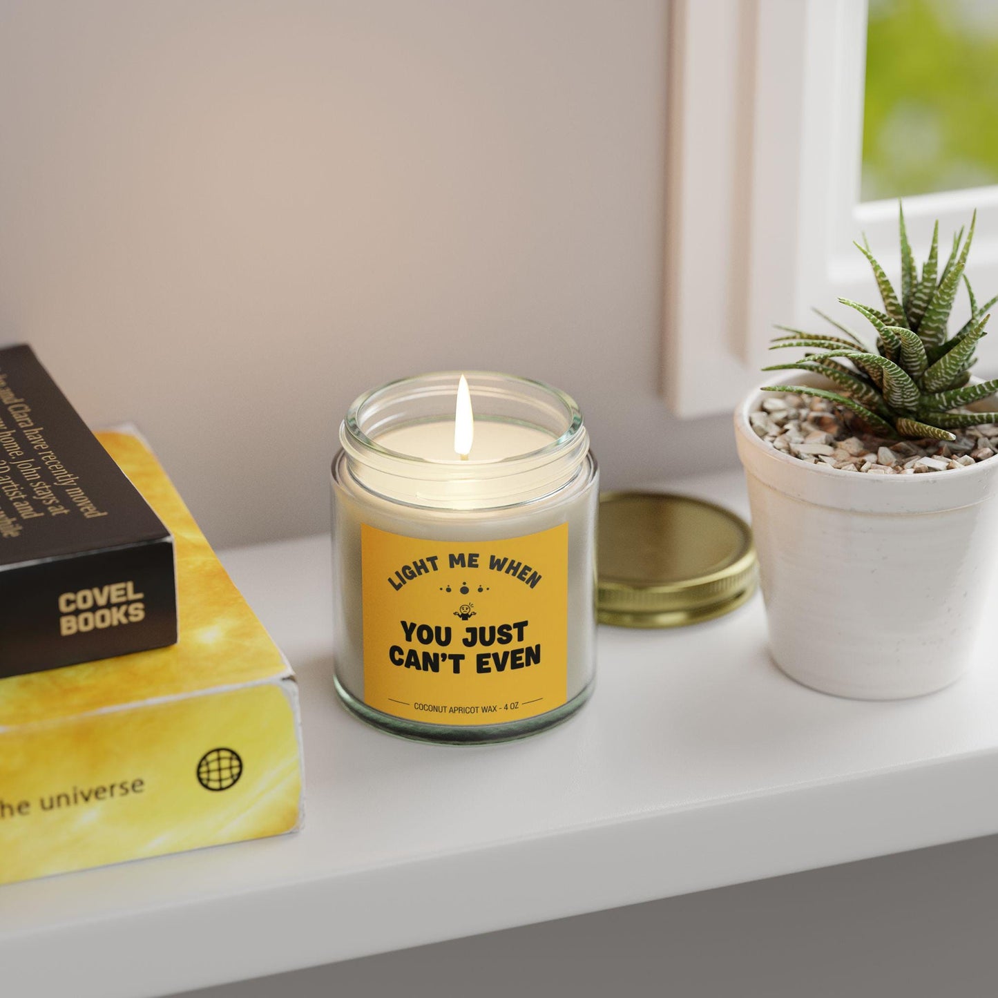 Funny yellow candle with cartoon label