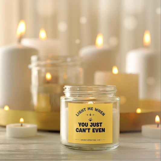 Funny yellow candle with cartoon label
