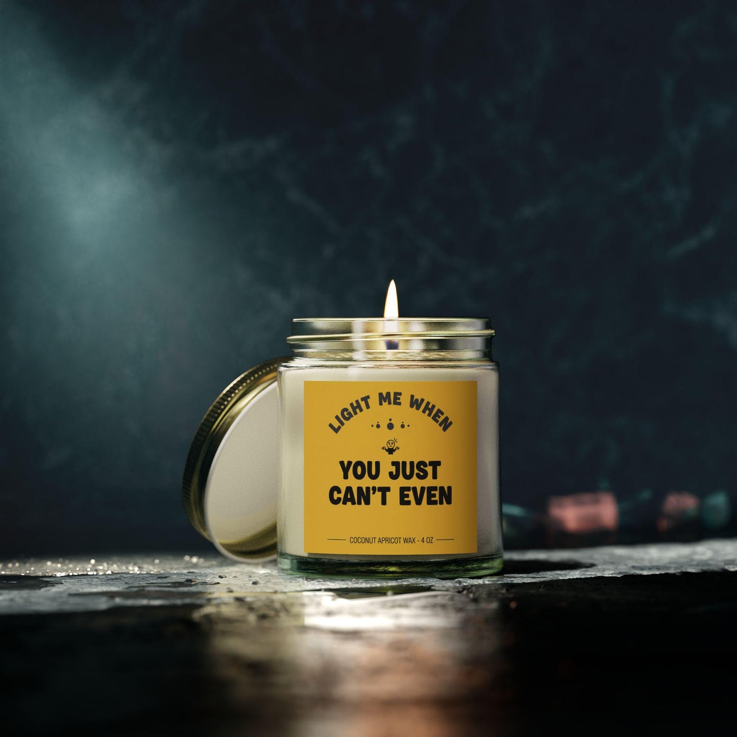 Funny yellow candle with cartoon label